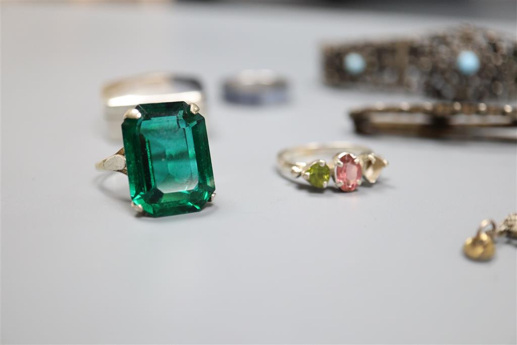 Mixed jewellery including silver brooch and white metal bracelets.